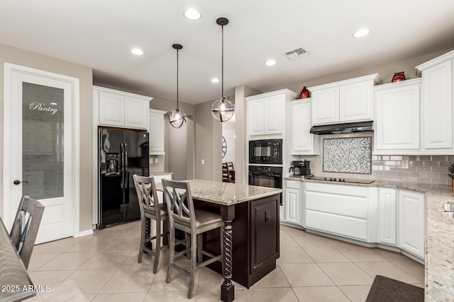 1078 W Redwood Ave, Queen Creek, AZ 85140 - kitchen with white cabinetry, light tile patterned floors, black appliances, and visible vents