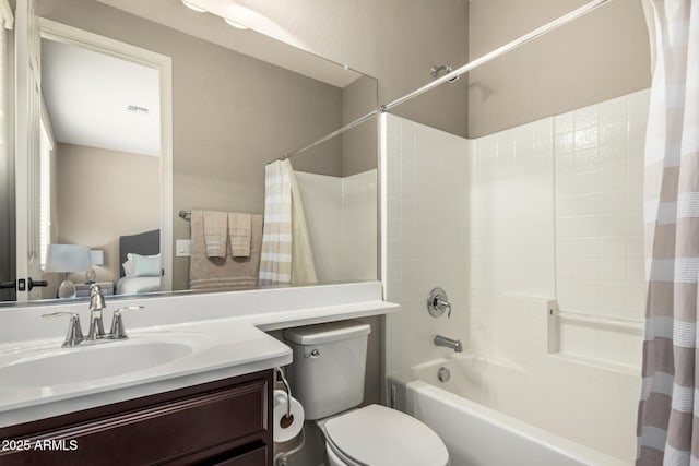 1078 W Redwood Ave, Queen Creek, AZ 85140 - bathroom with visible vents, toilet, vanity, and shower / bathtub combination with curtain