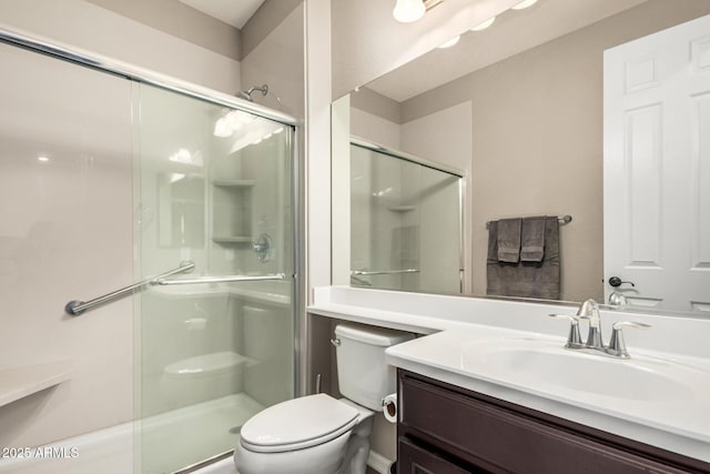 1078 W Redwood Ave, Queen Creek, AZ 85140 - bathroom featuring vanity, toilet, and a shower stall