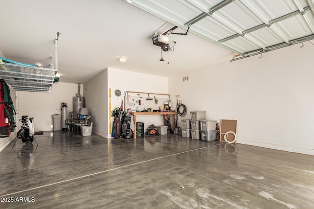 1078 W Redwood Ave, Queen Creek, AZ 85140 - garage with water heater, a workshop area, and a garage door opener
