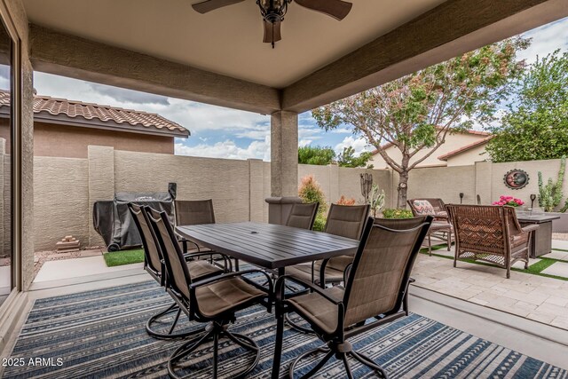 1078 W Redwood Ave, Queen Creek, AZ 85140 - deck featuring an outdoor hangout area, a fenced backyard, outdoor dining space, a ceiling fan, and a patio area
