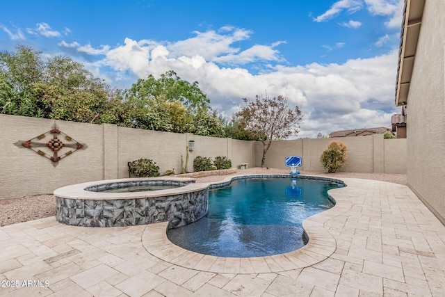 1078 W Redwood Ave, Queen Creek, AZ 85140 - view of swimming pool with a fenced backyard, a pool with connected hot tub, and a patio area