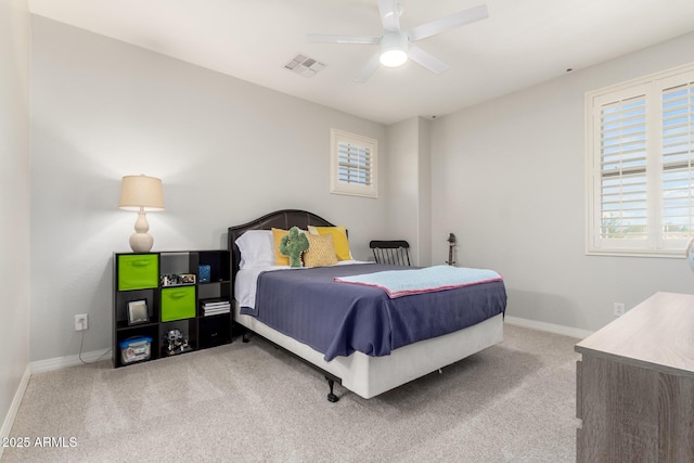 bedroom featuring carpet floors, baseboards, and ceiling fan