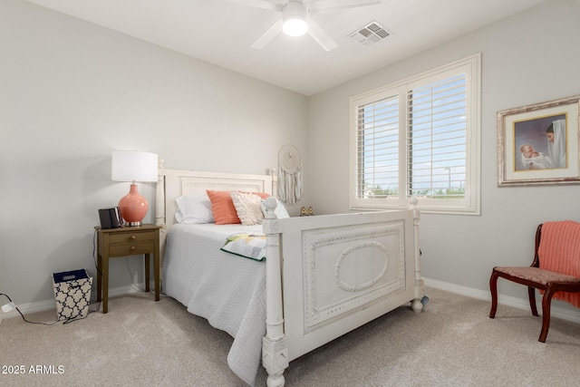 carpeted bedroom with baseboards and ceiling fan