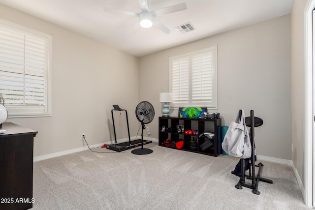 rec room featuring a ceiling fan, carpet flooring, and baseboards