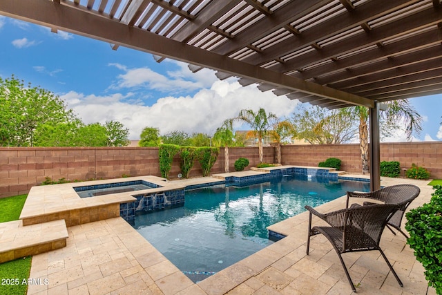 view of pool with a fenced backyard, a pool with connected hot tub, and a patio area