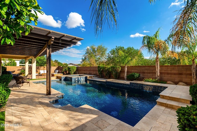 view of swimming pool with a fenced backyard, a patio, and a pool with connected hot tub