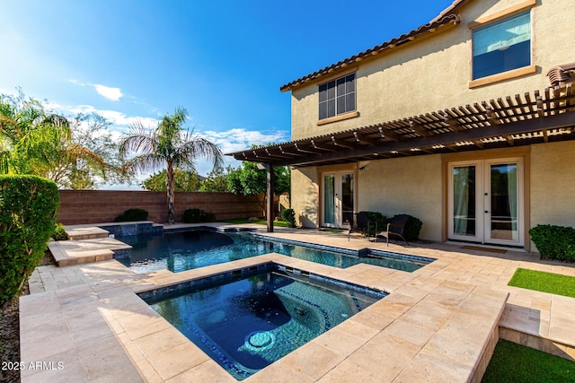 view of pool with french doors, an in-ground hot tub, a fenced backyard, a patio, and a pergola