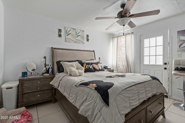 bedroom featuring a ceiling fan and light tile patterned flooring