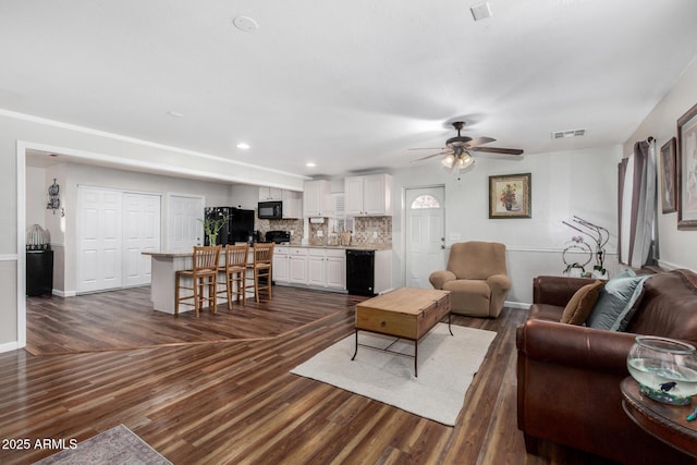 2419 E Billings St, Mesa, AZ 85213 - living room featuring dark wood-type flooring, ceiling fan, baseboards, and recessed lighting