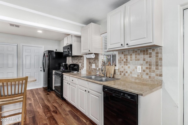 2419 E Billings St, Mesa, AZ 85213 - kitchen featuring black appliances, a sink, white cabinets, light countertops, and recessed lighting