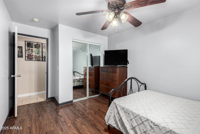 2419 E Billings St, Mesa, AZ 85213 - bedroom with wood finished floors, a closet, baseboards, and a ceiling fan