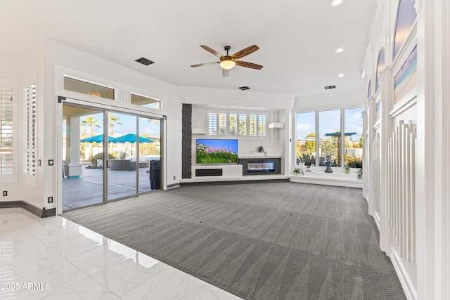 10417 N 180th Dr, Waddell, AZ 85355 - unfurnished living room with baseboards, visible vents, ceiling fan, marble finish floor, and recessed lighting