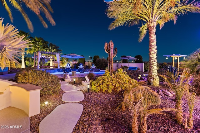 10417 N 180th Dr, Waddell, AZ 85355 - yard at twilight featuring a fenced in pool and a gazebo