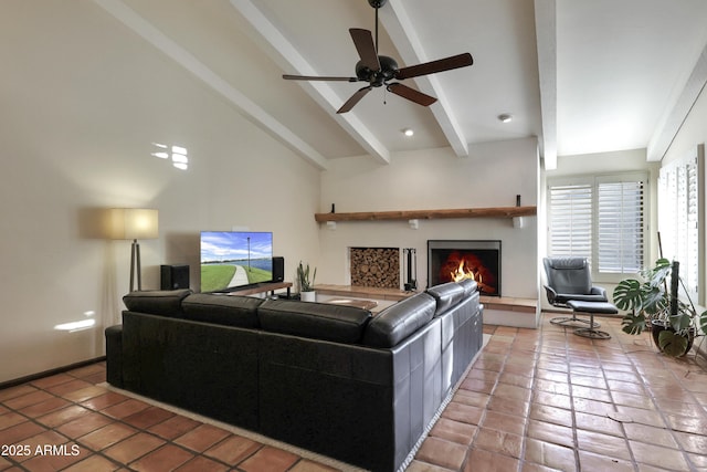 living room featuring ceiling fan, light tile patterned floors, high vaulted ceiling, and beamed ceiling