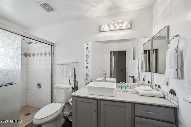 10401 N 52nd St Unit 210, Paradise Valley, AZ 85253 - full bath with toilet, vanity, visible vents, and a stall shower