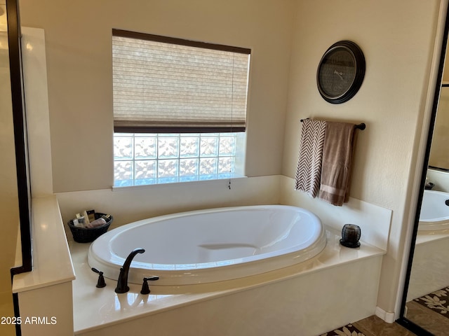 full bathroom featuring a bath