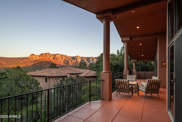 balcony featuring a mountain view