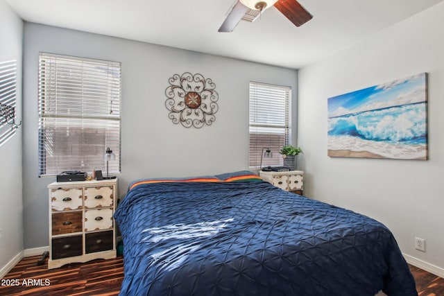 bedroom with wood-type flooring and ceiling fan