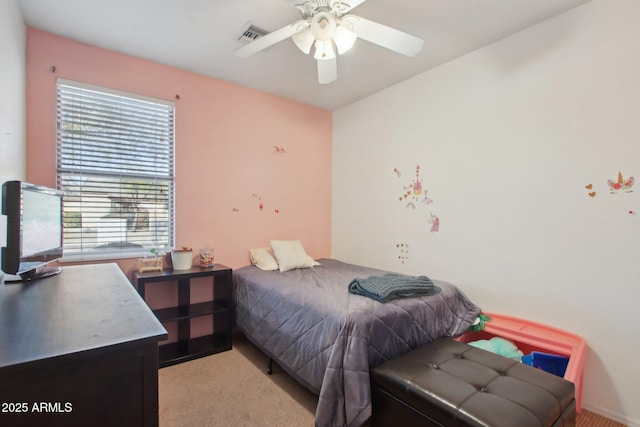 bedroom featuring ceiling fan and light colored carpet