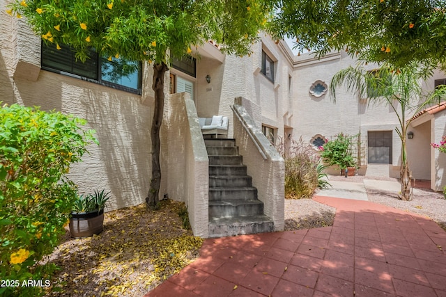 7800 E Lincoln Dr Unit 2029, Scottsdale, AZ 85250 - entrance to property with stucco siding and a patio area