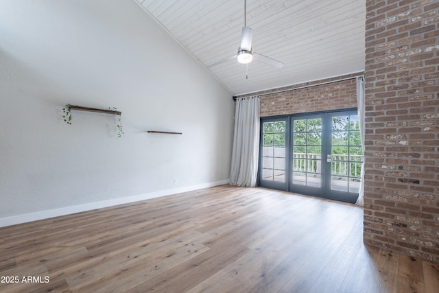 7800 E Lincoln Dr Unit 2029, Scottsdale, AZ 85250 - empty room with high vaulted ceiling, a ceiling fan, wood finished floors, and baseboards