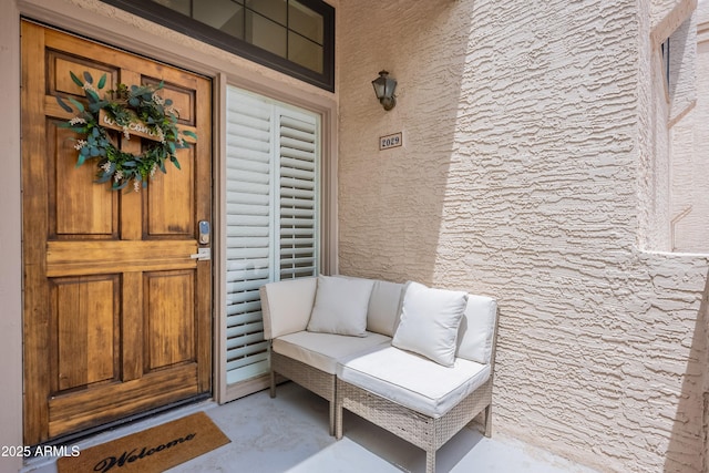 7800 E Lincoln Dr Unit 2029, Scottsdale, AZ 85250 - doorway to property featuring a porch and stucco siding