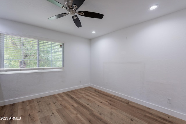 7800 E Lincoln Dr Unit 2029, Scottsdale, AZ 85250 - unfurnished room featuring light wood finished floors, baseboards, ceiling fan, and recessed lighting
