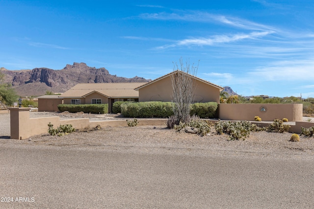 view of front of home with a mountain view