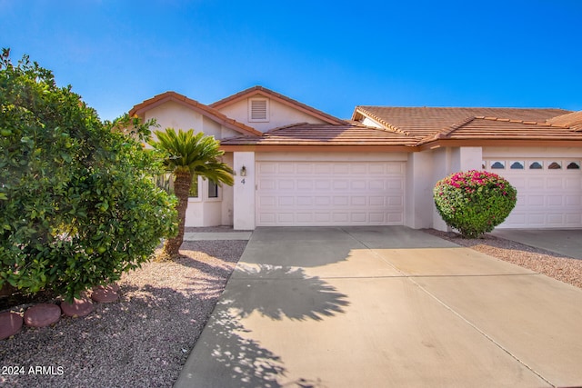 view of front of property with a garage