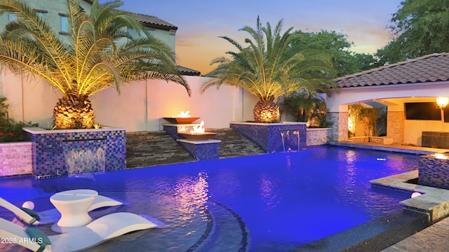 2985 N Point Ridge Rd, Buckeye, AZ 85396 - swimming pool featuring a fire pit