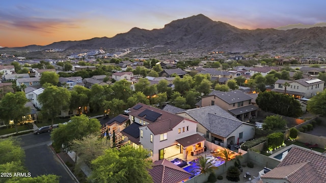 2985 N Point Ridge Rd, Buckeye, AZ 85396 - aerial view at dusk of a residential view and a mountain view
