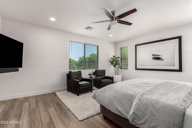 2985 N Point Ridge Rd, Buckeye, AZ 85396 - bedroom featuring wood finished floors, recessed lighting, baseboards, and a ceiling fan