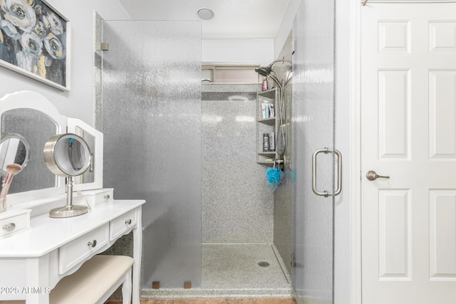 full bathroom featuring a stall shower