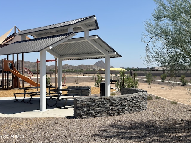 view of community with playground community and a gazebo