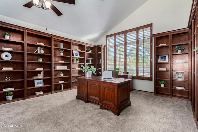 office area with ceiling fan, light carpet, and lofted ceiling