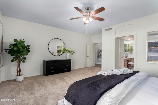 carpeted bedroom featuring ceiling fan and connected bathroom