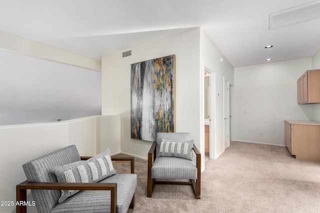 sitting room with light carpet