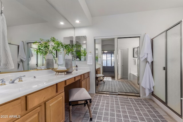 bathroom with vanity and plus walk in shower