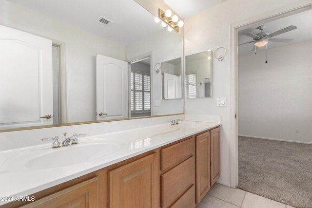 bathroom featuring vanity, ceiling fan, and tile patterned flooring