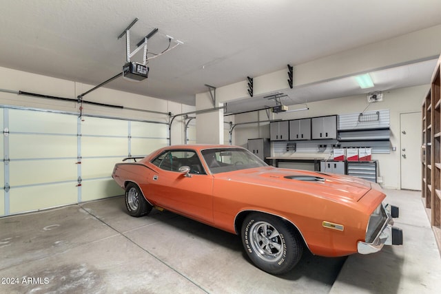 garage featuring a garage door opener