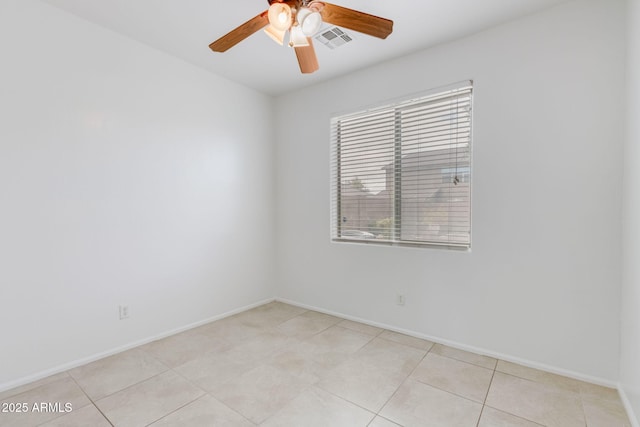 unfurnished room with light tile patterned flooring, visible vents, baseboards, and a ceiling fan