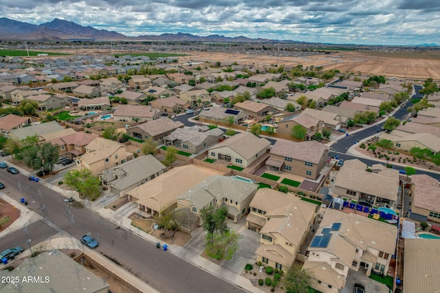 bird's eye view featuring a mountain view and a residential view