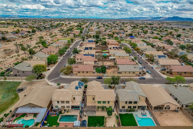 bird's eye view with a mountain view and a residential view