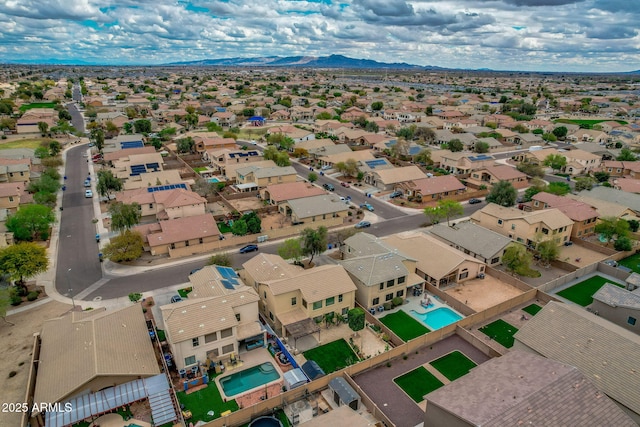 aerial view with a mountain view and a residential view