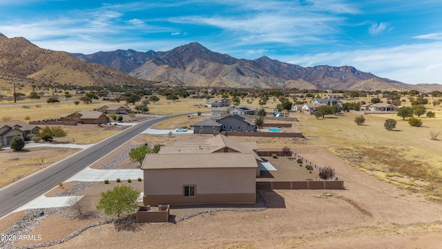 drone / aerial view with a residential view and a mountain view