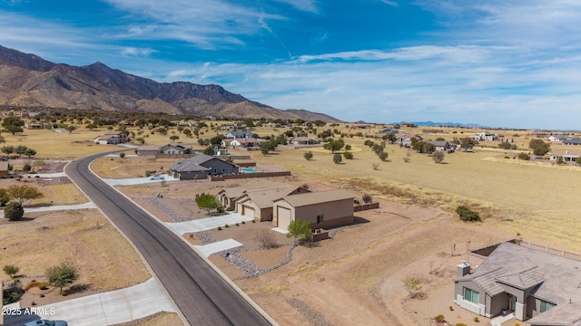 bird's eye view with a residential view and a mountain view