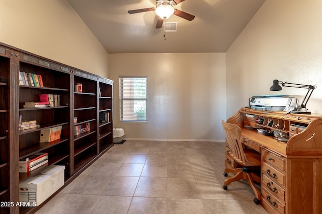 tiled office space featuring baseboards, visible vents, lofted ceiling, and a ceiling fan