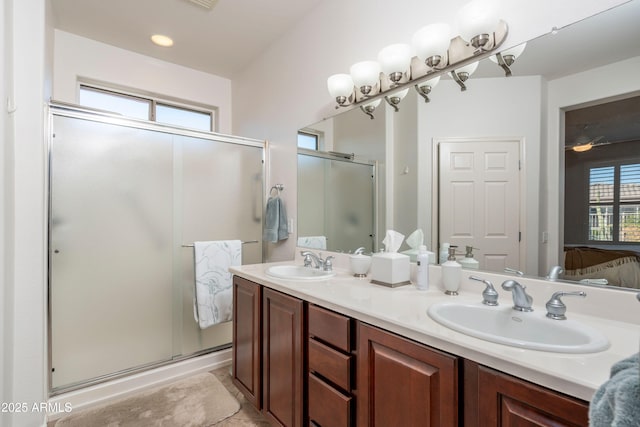 bathroom with vanity and walk in shower