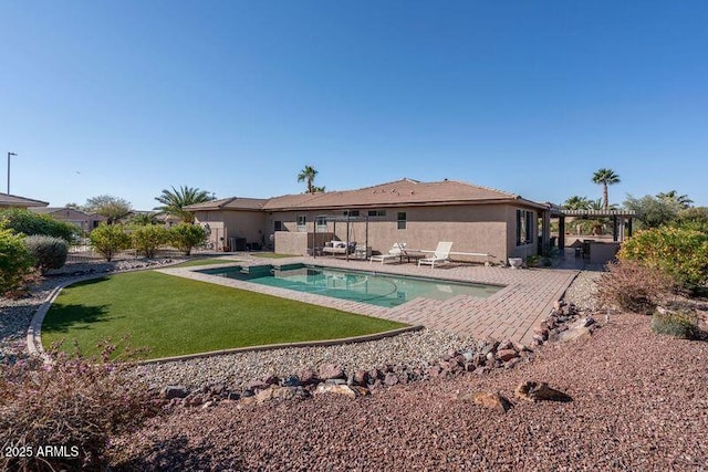 view of swimming pool with a pergola, a lawn, and a patio